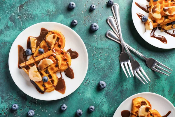 Heart Shaped Waffles Banana Slices Chocolate Sauce Color Background — Stock Photo, Image