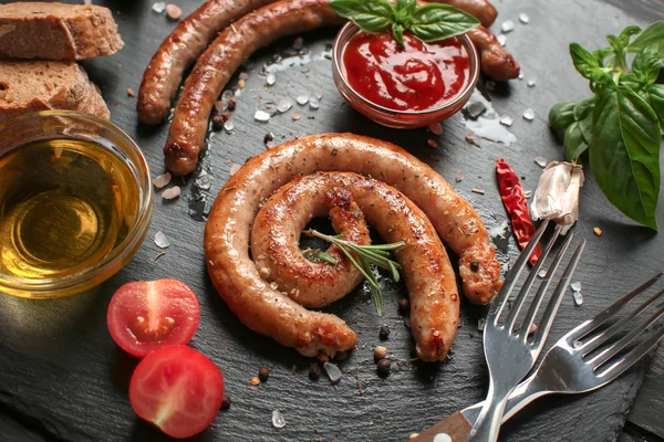 Spicy Fried Sausages Slate Plate — Stock Photo, Image