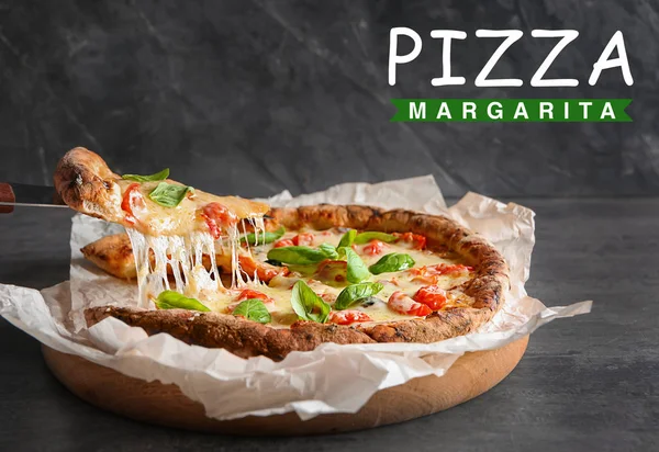 Delicious pizza Margarita on grey table