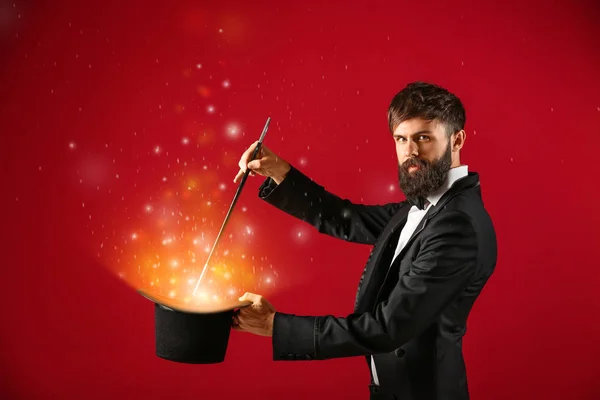 Male Magician Showing Trick Hat Color Background — Stock Photo, Image