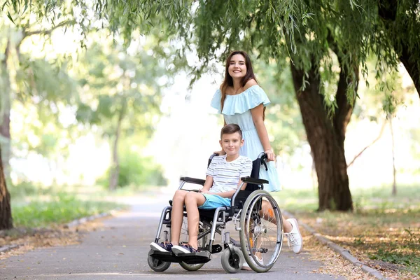 Teenage Boy Wheelchair His Mother Outdoors — Stock Photo, Image