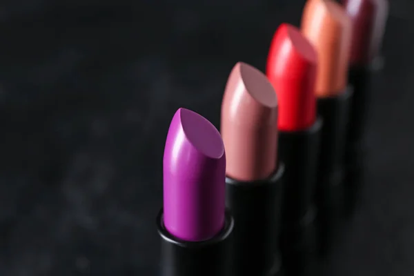 Lipsticks Different Shades Dark Background Closeup — Stock Photo, Image