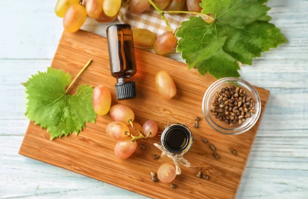 Bottles Grape Seed Oil Wooden Board Top View — Stock Photo, Image