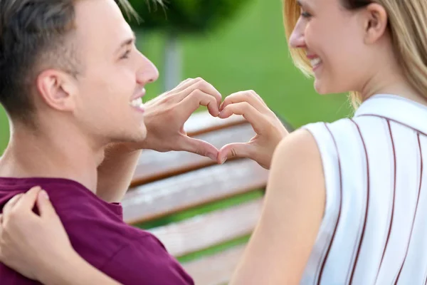 Cute Young Couple Making Heart Hands Outdoors — Stock Photo, Image