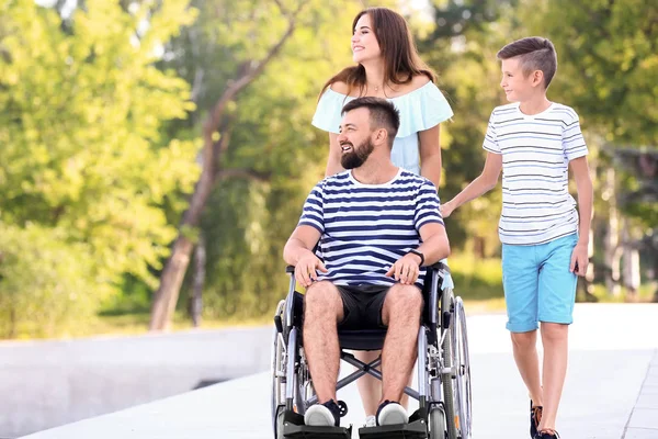 Young Man Wheelchair His Family Walking Outdoors — Stock Photo, Image