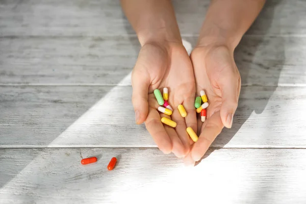 Female Hands Pills Wooden Background — Stock Photo, Image
