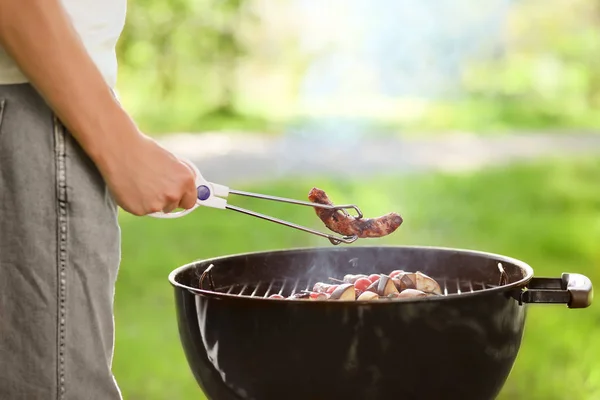 Man Cooking Sausages Vegetables Barbecue Grill Outdoors — Stock Photo, Image