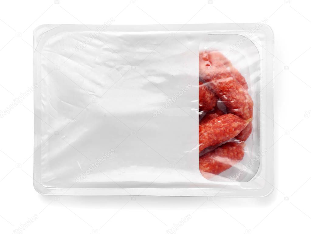 Packed sausages on white background