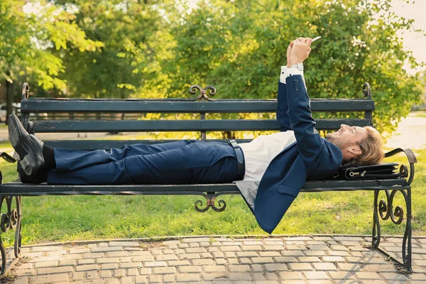 Handsome Young Businessman Taking Selfie While Lying Bench Park — Stock Photo, Image
