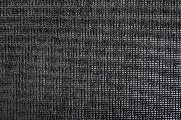 Black yoga mat, closeup