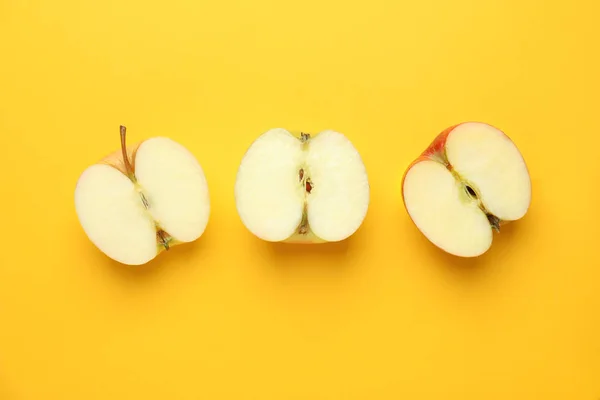 Skär Färska Äpplen Färg Bakgrunden — Stockfoto