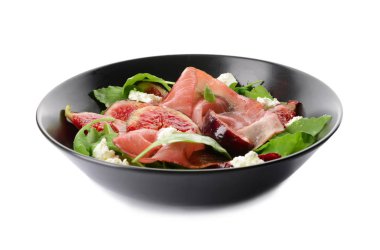 Beyaz zemin üzerine lezzetli incirli salata ile plaka