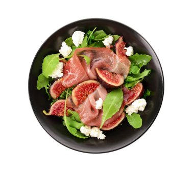 Beyaz zemin üzerine lezzetli incirli salata ile plaka