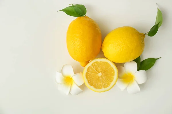 Ripe Juicy Lemons Exotic Flowers White Background Top View — Stock Photo, Image