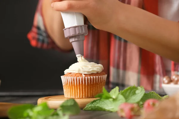 Woman Decorating Delicious Cupcake Cream Table Closeup — Stock Photo, Image