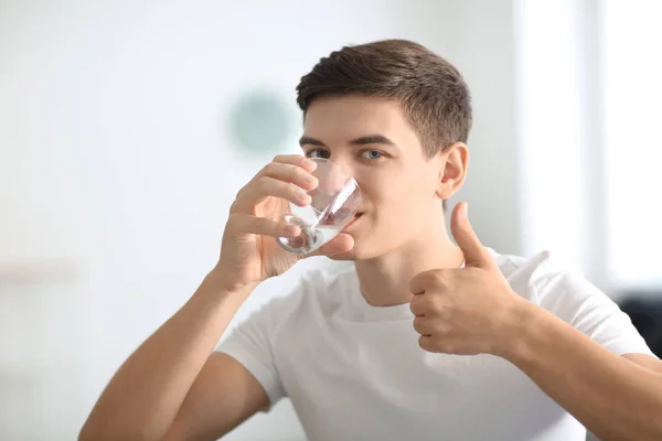 Young Man Drinking Water Home — Stock Photo, Image