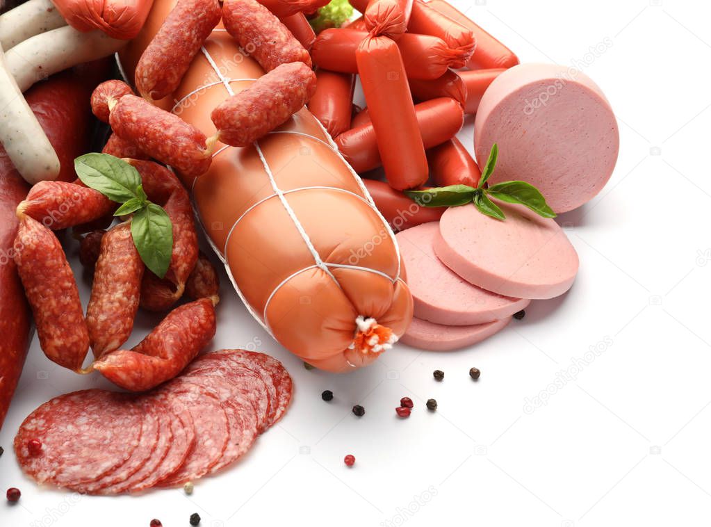 Different kinds of sausages on white background