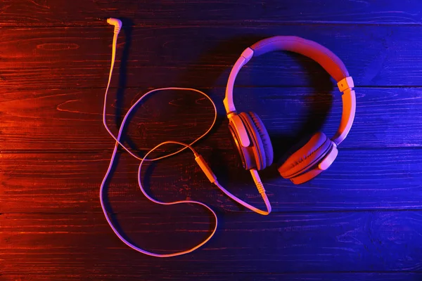 Modern Headphones Color Wooden Background — Stock Photo, Image