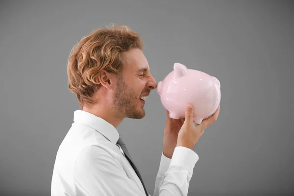 Handsome Man Piggy Bank Grey Background Stock Photo