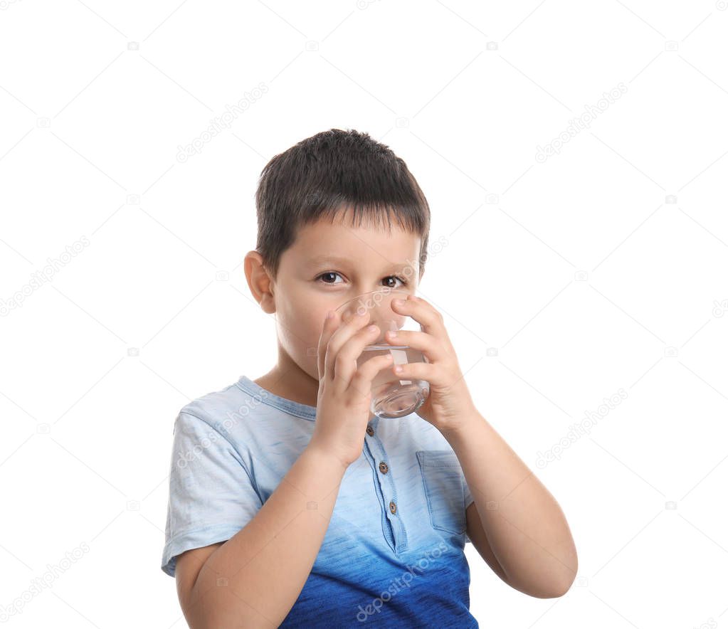 Little boy drinking fresh water on white background