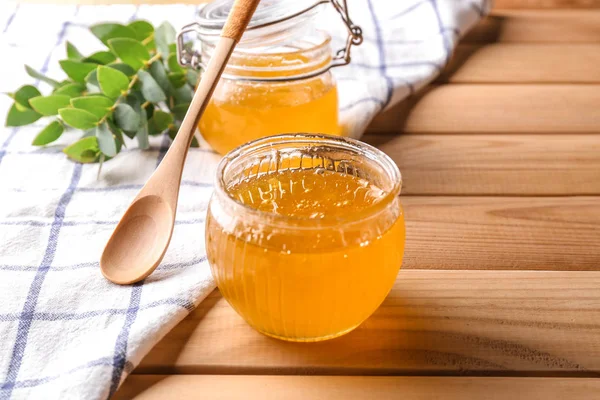 Glazen Pot Met Lekkere Honing Lepel Houten Tafel — Stockfoto