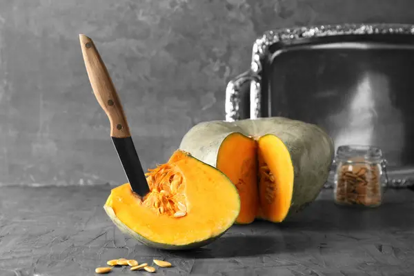 Cut Fresh Raw Pumpkin Knife Grey Table — Stock Photo, Image