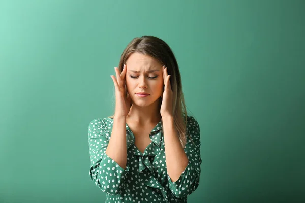 Beautiful Young Woman Suffering Headache Color Background — Stock Photo, Image
