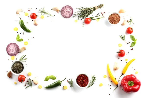 Frame made of spices and herbs on white background