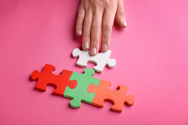 Female Hand Pieces Puzzle Color Background — Stock Photo, Image