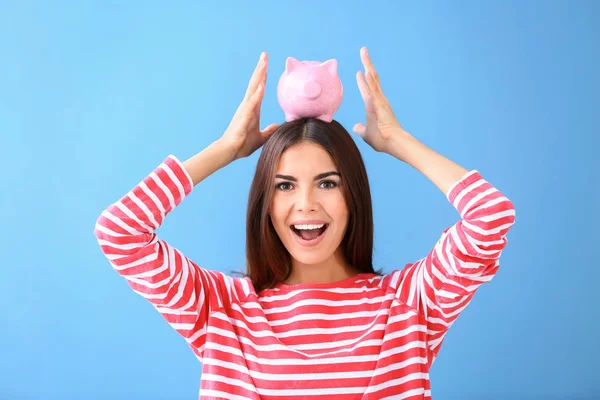Beautiful Young Woman Piggy Bank Color Background — Stock Photo, Image