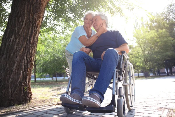 Happy Senior Man Wheelchair His Wife Outdoors — Stock Photo, Image