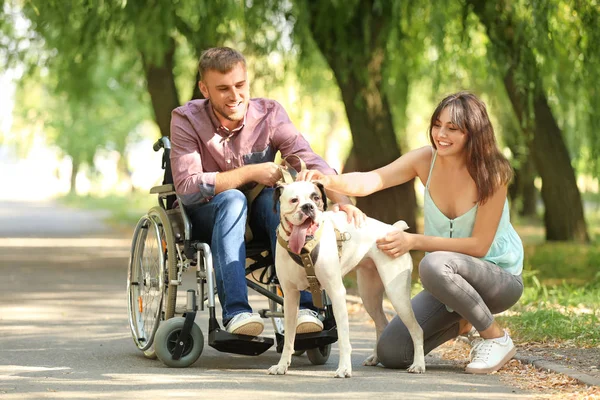 Young Man Wheelchair His Wife Service Dog Outdoors — Stock Photo, Image