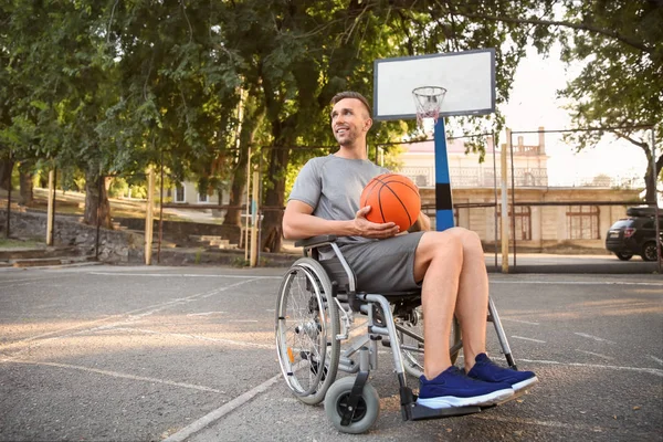 Sporty Young Man Ball Sitting Wheelchair Outdoors — Stock Photo, Image