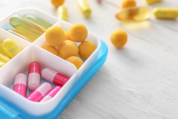 Plastic Container Pills White Wooden Table Closeup — Stock Photo, Image