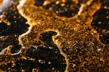 Altın ve siyah dokulu arka plan