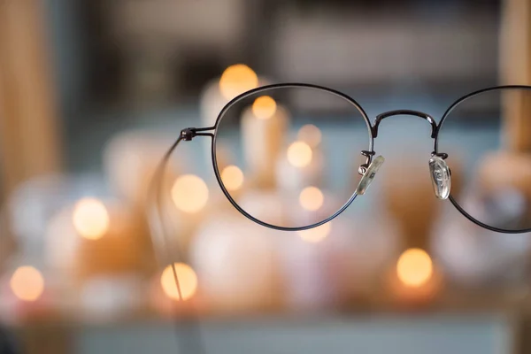 Eyeglasses on blurred background, closeup