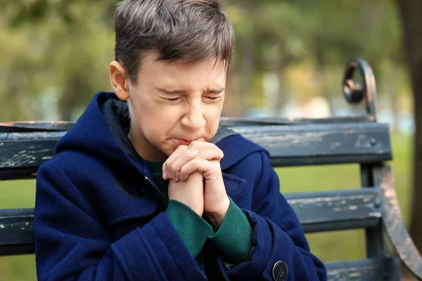 Praying Little Boy Sitting Bench Park — Stock Photo, Image