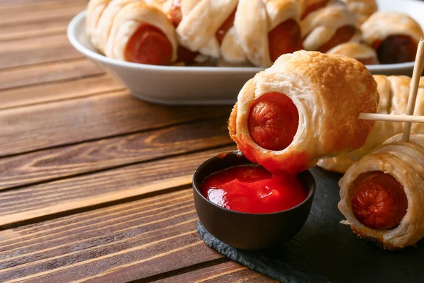 Delicious Sausage Rolls Bowl Ketchup Wooden Table — Stock Photo, Image