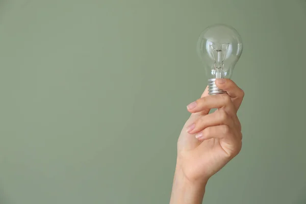 Female Hand Eco Light Bulb Color Background — Stock Photo, Image