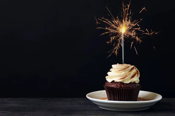 Tasty Chocolate Cupcake Sparkler Wooden Table Dark Background — Stock Photo, Image