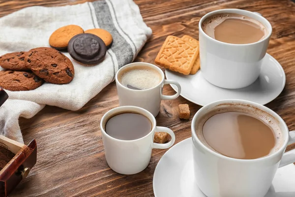 Cups Tasty Aromatic Coffee Cookies Wooden Table — Stock Photo, Image