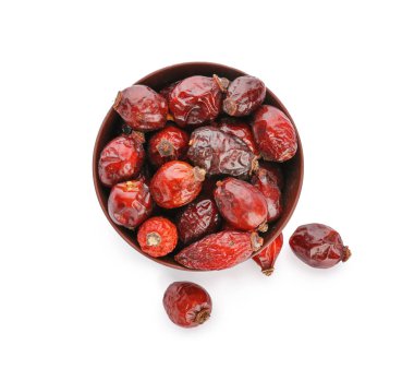 Rose hips beyaz arka plan üzerinde ile kase