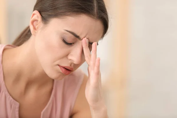 Woman Suffering Headache Indoors — Stock Photo, Image