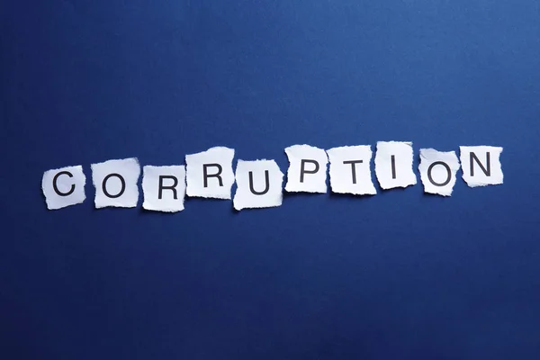 Torn Pieces Paper Word Corruption Blue Background — Stock Photo, Image