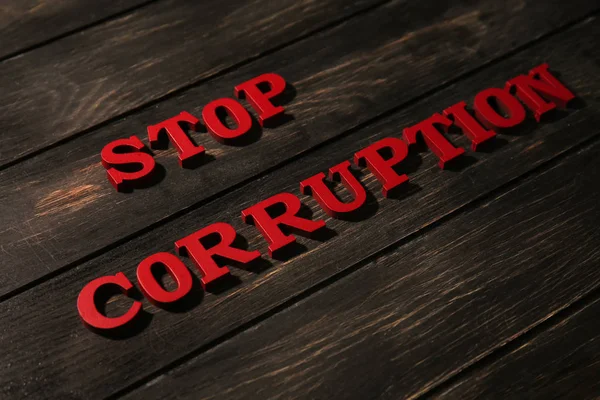 Text Stop Corruption Wooden Background — Stock Photo, Image