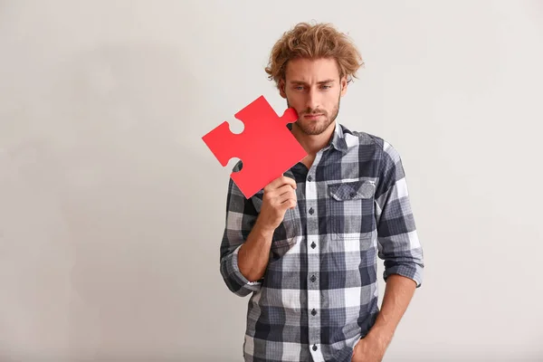 Thoughtful Young Man Piece Jigsaw Puzzle Light Background — Stock Photo, Image