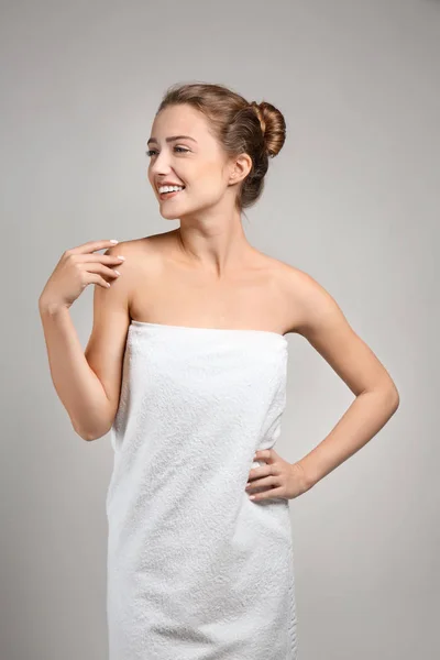 Beautiful Young Woman Wrapped Towel Grey Background — Stock Photo, Image