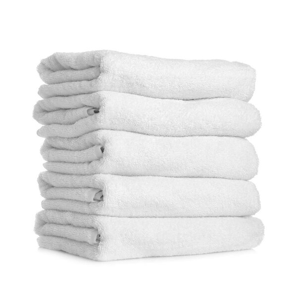 Stack of clean towels on white background