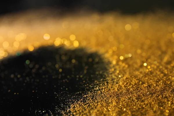 Gouden Glitters Donkere Achtergrond Close — Stockfoto