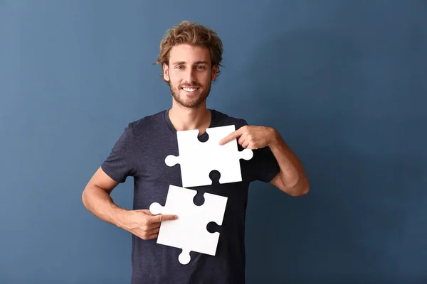 Young Man Pieces Jigsaw Puzzle Color Background — Stock Photo, Image